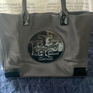 ToryBurch tote bag in color black.